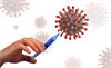 impfende Hand mit Virus